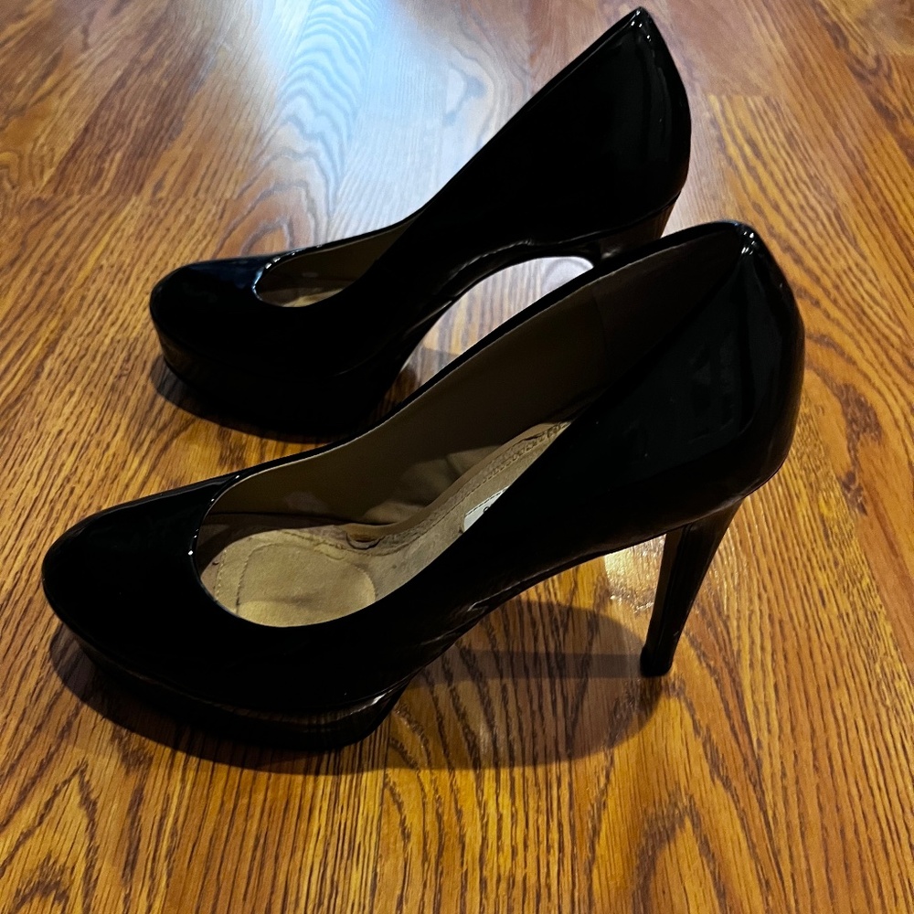 Black patent Diane von Furstenberg platform pumps